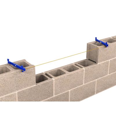 Bon Tool heavy duty adjustable line stretchers in use on masonry block wall maintaining tight mason line for straight courses