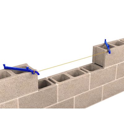 Bon Tool cast aluminum line stretchers holding mason line in place on block wall for straight and level masonry courses