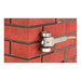 Skatewheel mortar raker with large wheels and adjustable depth for masonry joint removal in use 