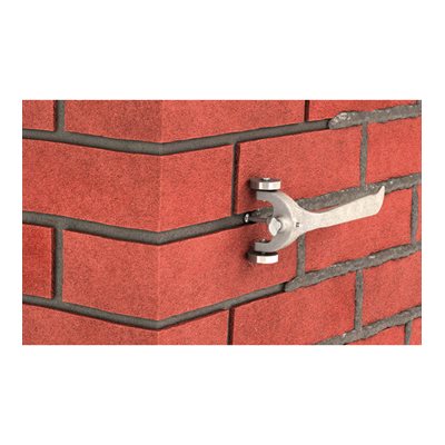 Cartwheel mortar raker with dual steel wheels and adjustable depth for masonry joint removal in use 