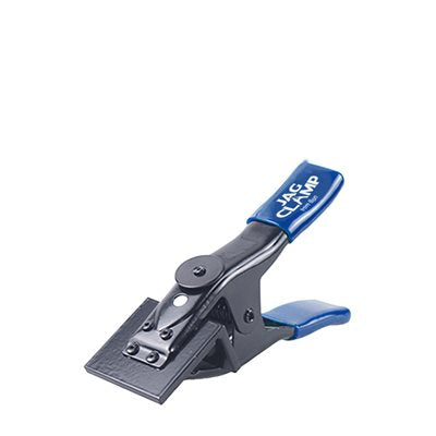 Bon Tool JAG clamp used for vertical line holding on masonry wall with secure string notch grip