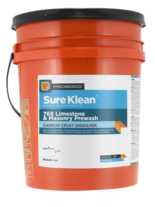 Orange bucket of Prosoco Sure Klean 766 Limestone & Masonry Prewash on a brown background