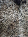 Close-up of a textured surface with black and gray patterns