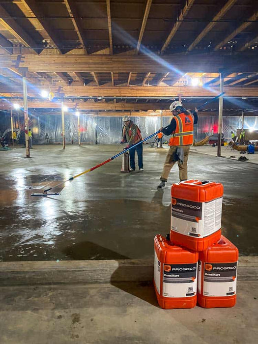 DensiKure one-step concrete cure and densifier applied to smooth steel trowel finished slab