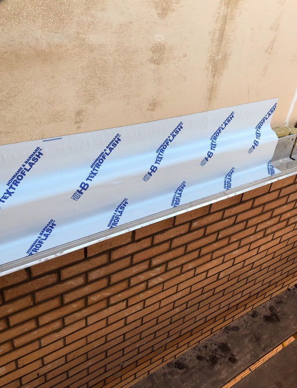 Hohmann and Barnard Textroflash self-adhered flashing membrane used for moisture control in masonry cavity wall construction