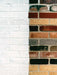 Close-up of a brick wall with a white background
