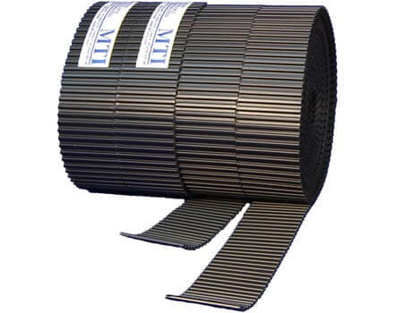 A roll of MTI Mortar Belt, which is designed to prevent mortar build-up in CMU walls, displayed on a plain background.