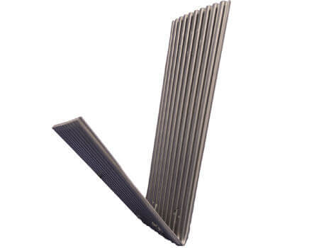 A V-shaped, gray high-impact polystyrene Trash Mortar Diverter piece with corrugations.