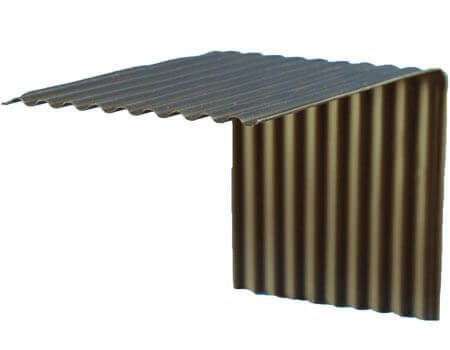 A brown corrugated Window Drainage Plane installed on a white surface, designed for sub-sill drainage applications.