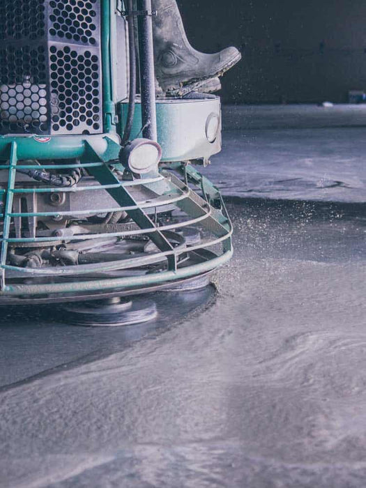 Floor polisher in action on a concrete floor