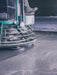Floor polisher in action on a concrete floor