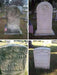 Collage of four gravestones in a cemetery with American flags.