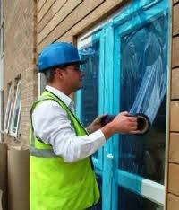 2 Mil Blue Tac window tape for weatherproofing, moisture protection, and professional window installation