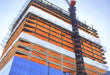 Construction safety netting designed to contain debris and protect workers and pedestrians