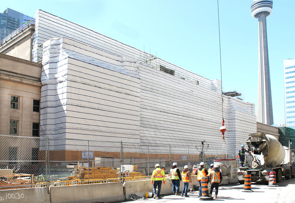 Heavy duty Scaf-Lite 12 mil scaffolding cover used for jobsite weather containment