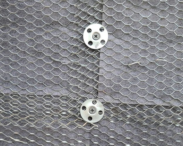 LathNet 27 by 97 inch mortar net providing support for mortar in brick and block walls