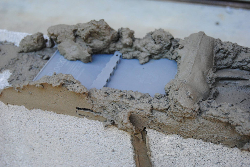 Mortar Net BlockFlash masonry flashing used to direct water out of CMU wall systems and prevent moisture intrusion