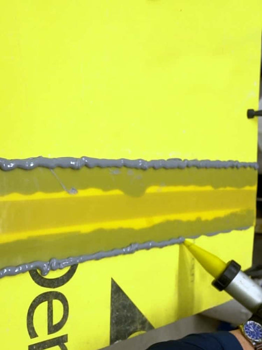 PROSOCO R-Guard SureSpan Adhesive for wall moisture barriers, providing strong adhesion to masonry and exterior walls