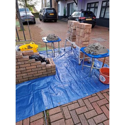 Rhinoboard by Bon heavy-duty mortar board used by masons for mixing mortar and holding bricklaying materials