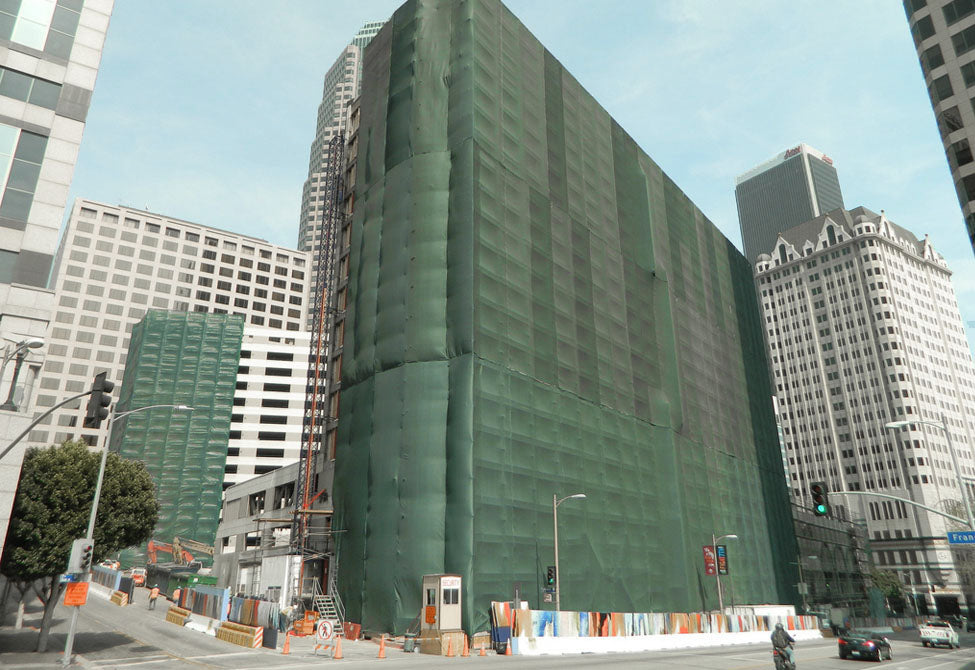 70 percent mesh tarp installed on scaffolding for debris containment and shade protection